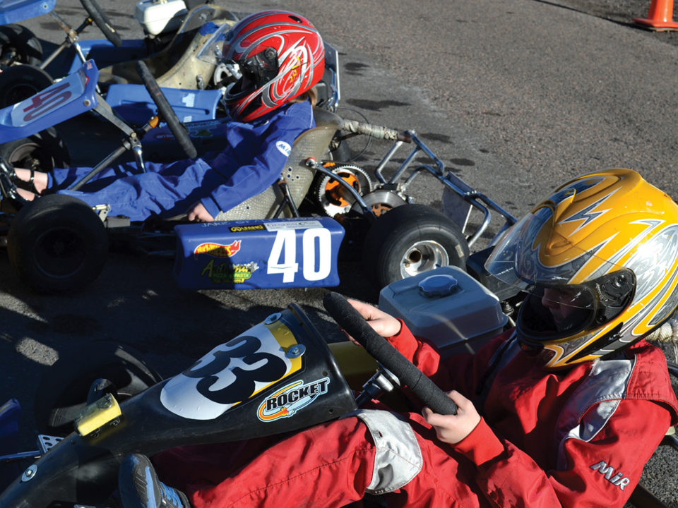 Teens in go-karts