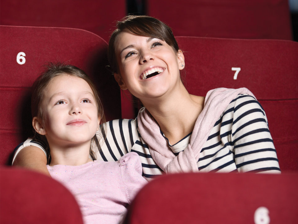 Mother and daughter at the movies