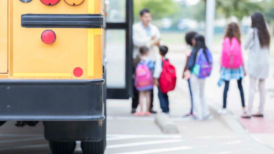 Kids getting on school bus, Federal Tax Credit Scholarship