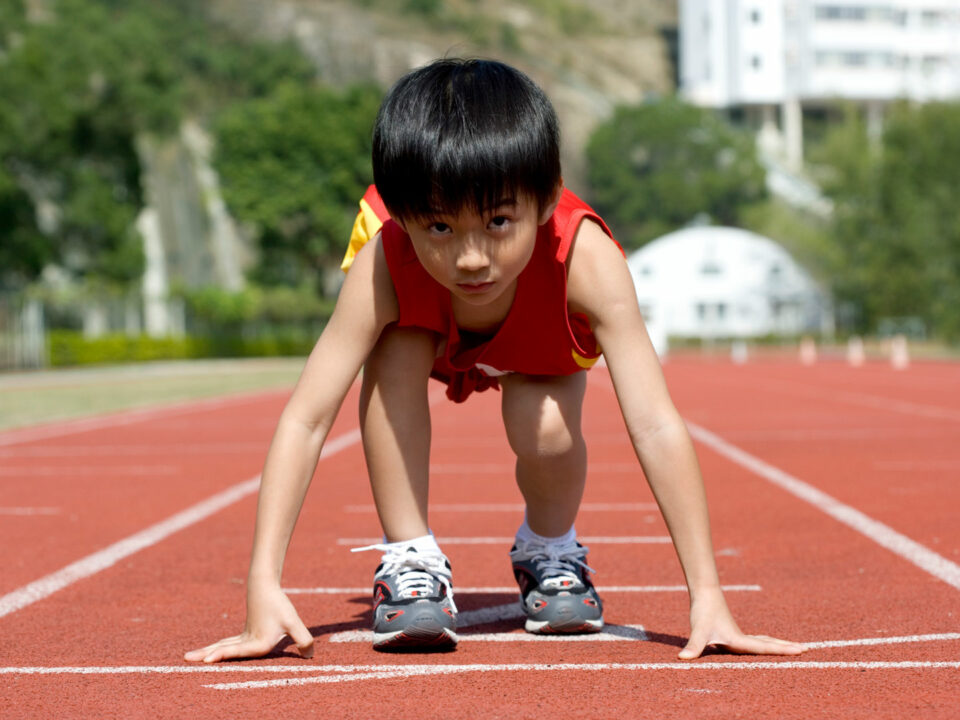 Boy on race track