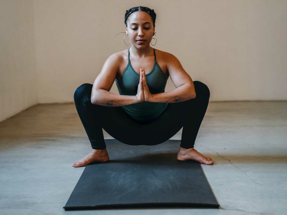 Woman in Garland Pose